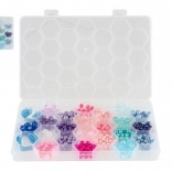 Kleurrijke plastic kralen met koord in doosje