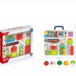 Manipulatiebord in koffertje voor kinderen