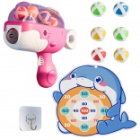 Pink children's ball gun with velcro and whale-shaped target