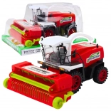 Rode landbouwmachine met aandrijving