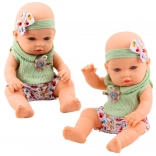 Baby Doll in Green Outfit with Floral Pattern and Headband with Bow