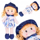 Soft textile doll in a hat