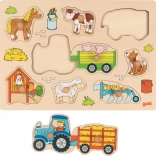 Goki wooden peg puzzle tractor on the farm