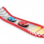 Inflatable racing track with slide and floats