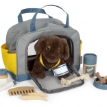 Chien en peluche avec ensemble de soins de Small Foot