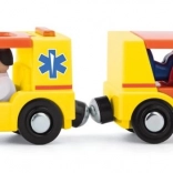 Ambulance with trailer and people